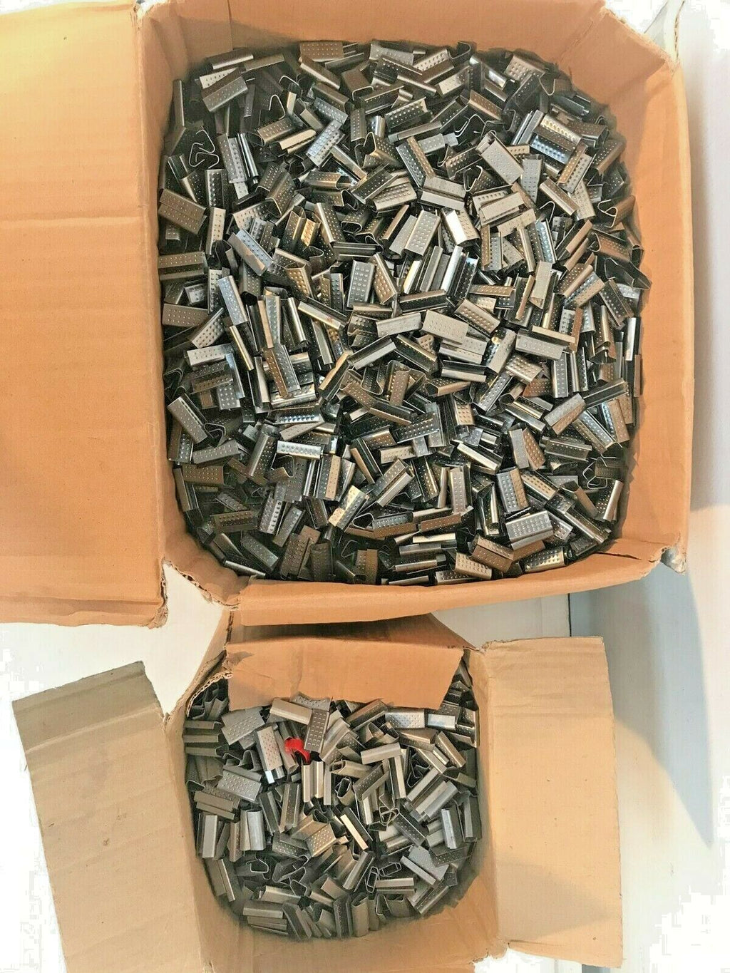 Sigilli per reggetta 28 mm a stock